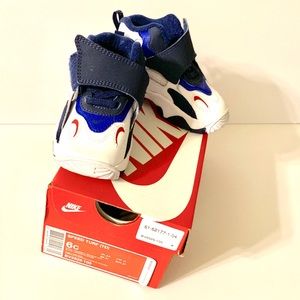 Selling Toddler White blue & red Nike Speed Turf.